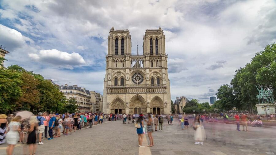 Paris: Notre Dame Cathedral Exterior Tour with Free Entry - The bells and towers that survived the 2019 fire