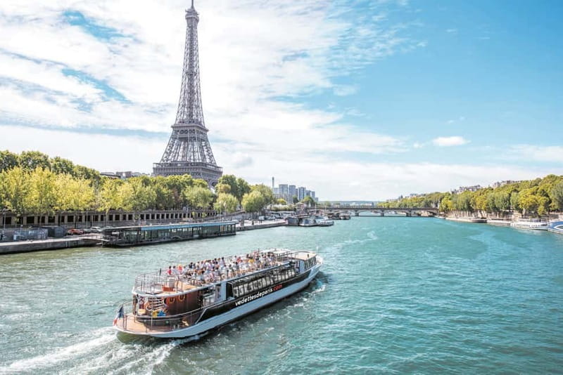 Paris: Seine River Cruise with a Live Guide - Grand Palais and the bridges beneath you