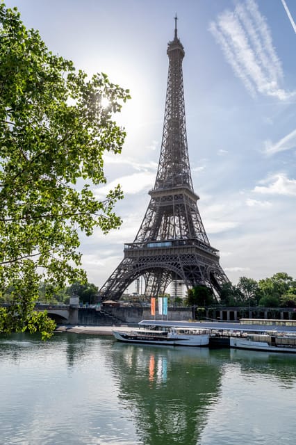 Paris: Seine River Cruise with Champagne from Eiffel Tower - Upper deck views, indoor seating, and weather