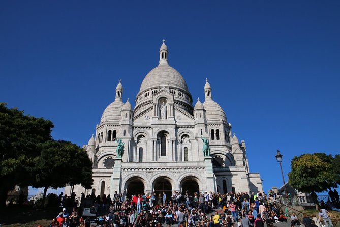 Paris Top Sights Half Day Walking Tour with a Fun Guide - From Hôtel de Ville to the Arc de Triomphe