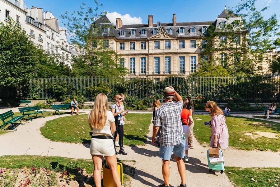 Paris: Walking Food Tour with Cheese, Wine and Delicacies - The market stop and the local side of Le Marais