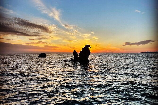 Scandola at sunset: Girolata & Corsican flavours - Scandola Nature Reserve from the water