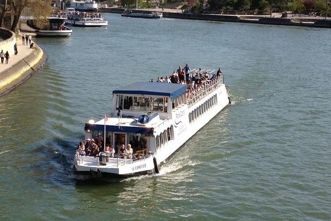 Seine River Cruise and Paris Canals Tour - Guide quality, seating, and onboard comfort