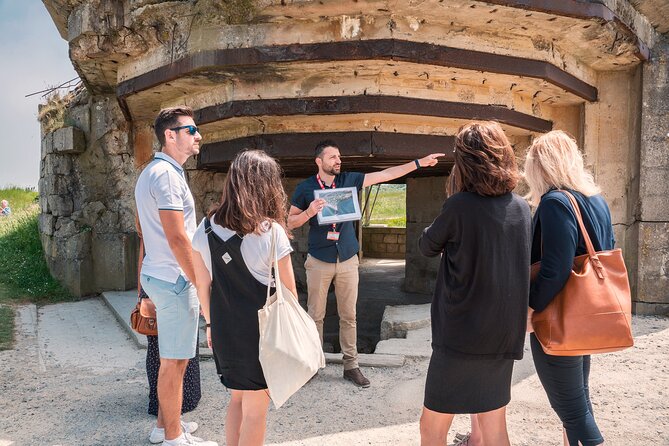 Small Group Guided D-Day Tour and Mémorial de Caen Museum - Omaha Beach is peaceful now, which makes it harder to picture