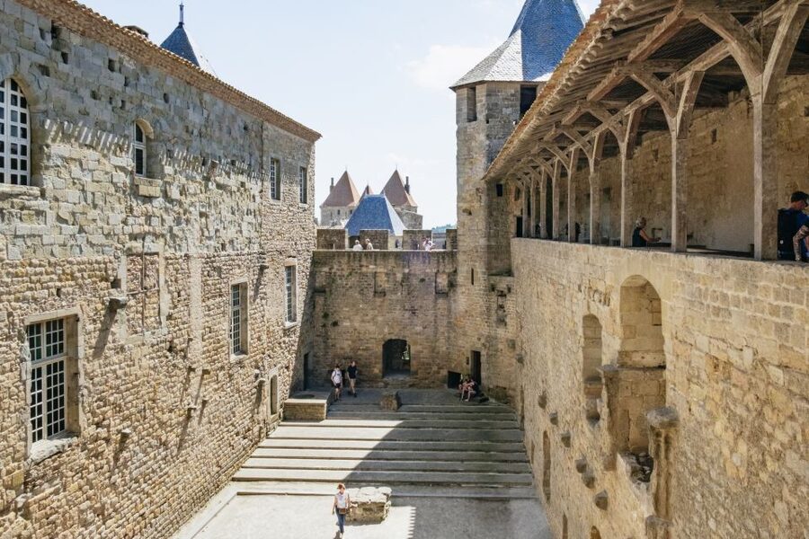 Toulouse: Carcassonne Day Trip by Coach with Audioguide - Lunch, shopping, and the modern Cité