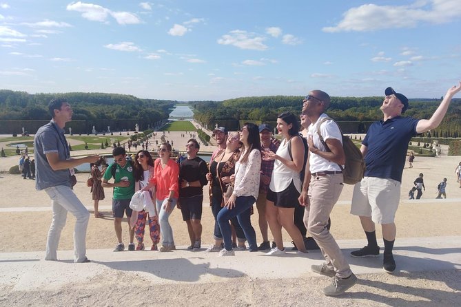 Versailles Bike Tour with Market, Gardens & Guided Palace Tour - Entering the château after the outdoor tour