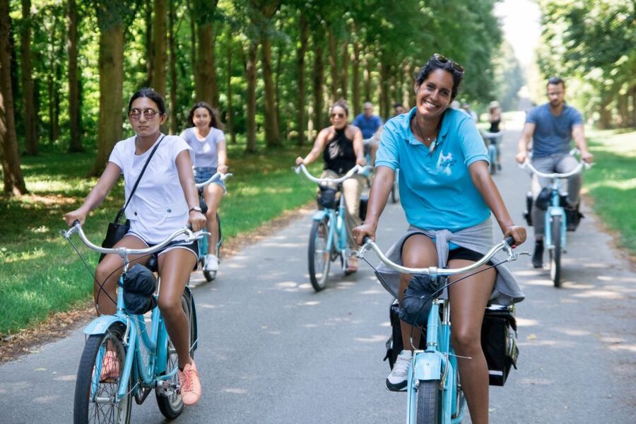 Versailles Bike Tour with Palace & Queen Farm Entrance - A picnic beside the canal