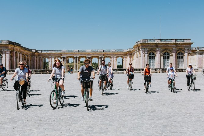 Versailles Domain Bike Tour with Palace Entry by Train from Paris - Cycling the Grand Canal and royal gardens