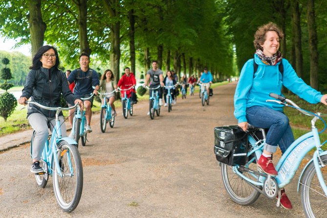 Versailles Palace Bike Tour with Market & Marie-Antoinette hamlet - Royal forests and the Apollo Fountain
